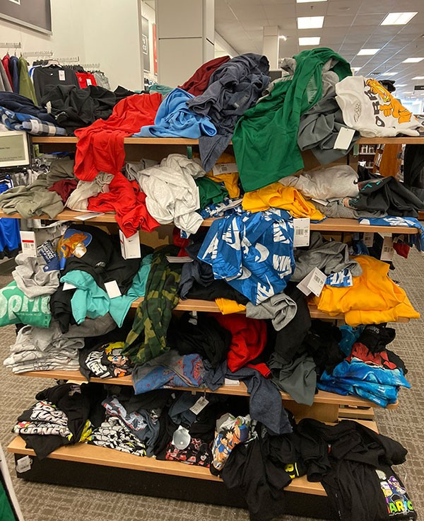 messy clothing shelves at kohl's department store